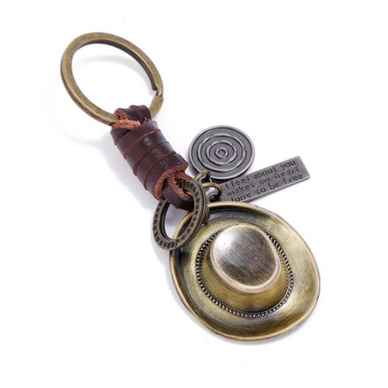 图片 European and American new accessories hand-woven retro alloy cowboy hat cowhide keychain personality creative car pendant